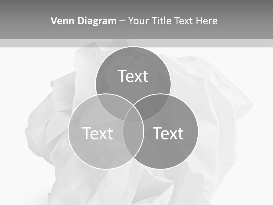 A Crumpled Ball Of Paper On A White Background PowerPoint Template