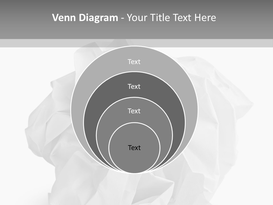 A Crumpled Ball Of Paper On A White Background PowerPoint Template