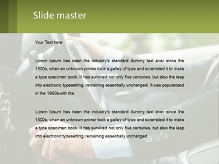 A Man Driving A Car With A Key Chain In His Hand PowerPoint Template