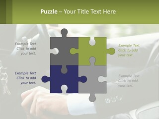 A Man Driving A Car With A Key Chain In His Hand PowerPoint Template