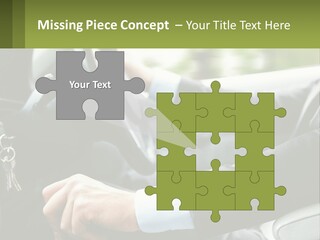 A Man Driving A Car With A Key Chain In His Hand PowerPoint Template