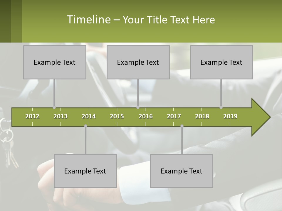 A Man Driving A Car With A Key Chain In His Hand PowerPoint Template