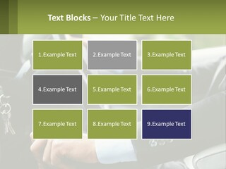 A Man Driving A Car With A Key Chain In His Hand PowerPoint Template