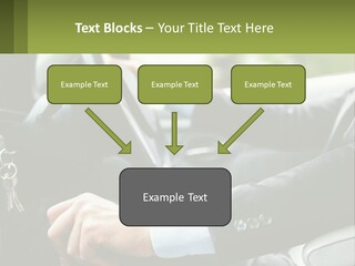 A Man Driving A Car With A Key Chain In His Hand PowerPoint Template