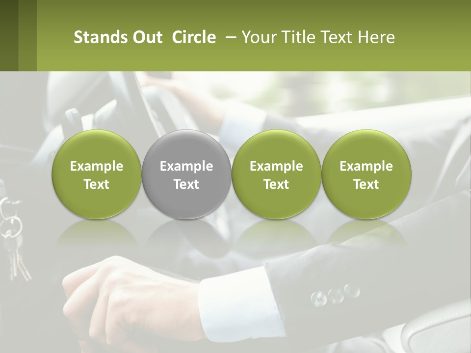 A Man Driving A Car With A Key Chain In His Hand PowerPoint Template