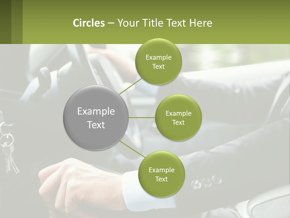 A Man Driving A Car With A Key Chain In His Hand PowerPoint Template