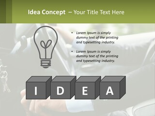 A Man Driving A Car With A Key Chain In His Hand PowerPoint Template