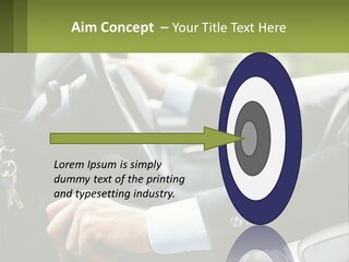 A Man Driving A Car With A Key Chain In His Hand PowerPoint Template