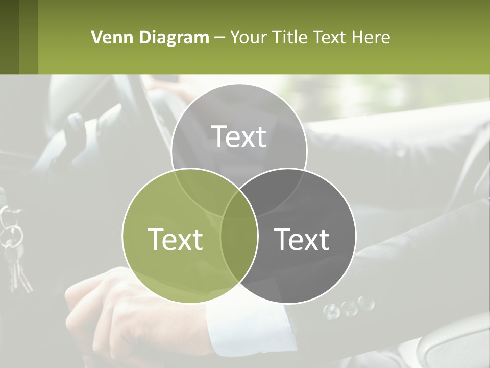 A Man Driving A Car With A Key Chain In His Hand PowerPoint Template