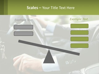 A Man Driving A Car With A Key Chain In His Hand PowerPoint Template