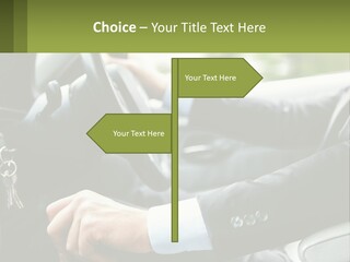 A Man Driving A Car With A Key Chain In His Hand PowerPoint Template