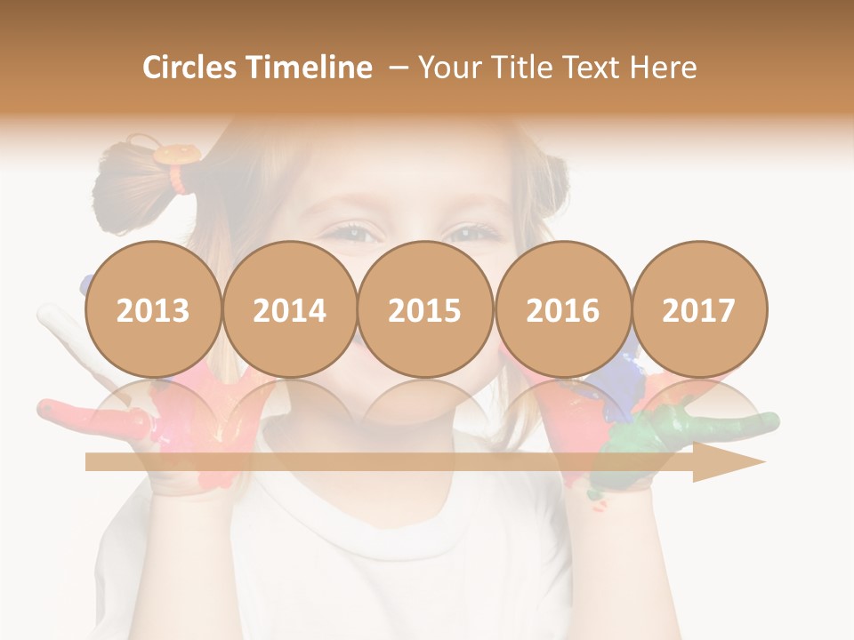 A Little Girl Holding Her Hands Painted In Different Colors PowerPoint Template