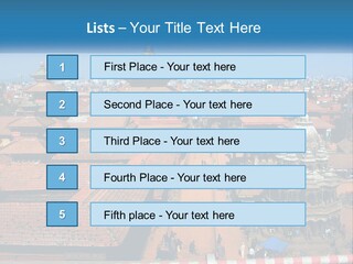 A Large Group Of Buildings With A Sky Background PowerPoint Template
