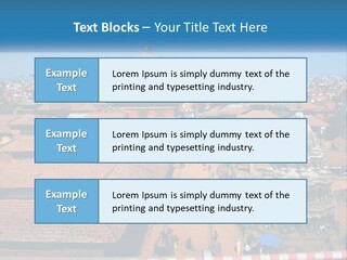 A Large Group Of Buildings With A Sky Background PowerPoint Template