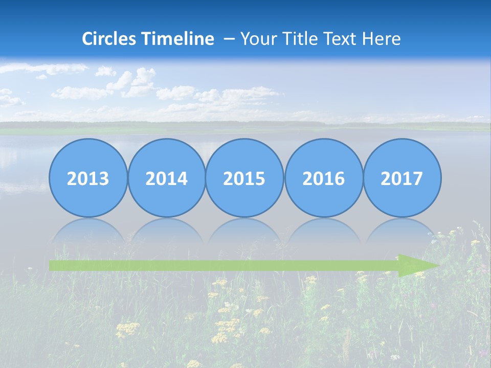 A Lake With Grass And Blue Sky In The Background PowerPoint Template