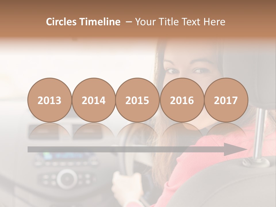 A Woman Driving A Car With A Cell Phone In Her Hand PowerPoint Template