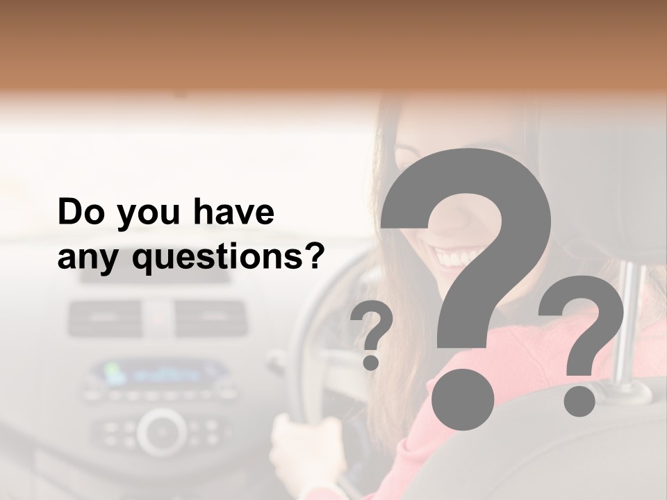 A Woman Driving A Car With A Cell Phone In Her Hand PowerPoint Template