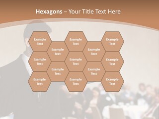 A Man In A Suit Is Giving A Presentation PowerPoint Template