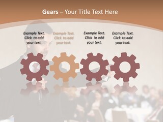 A Man In A Suit Is Giving A Presentation PowerPoint Template