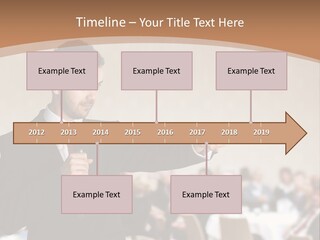 A Man In A Suit Is Giving A Presentation PowerPoint Template