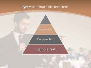 A Man In A Suit Is Giving A Presentation PowerPoint Template