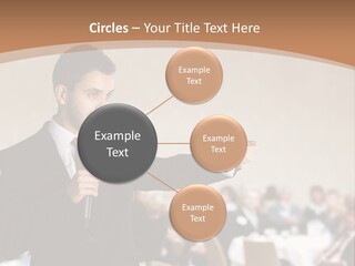 A Man In A Suit Is Giving A Presentation PowerPoint Template