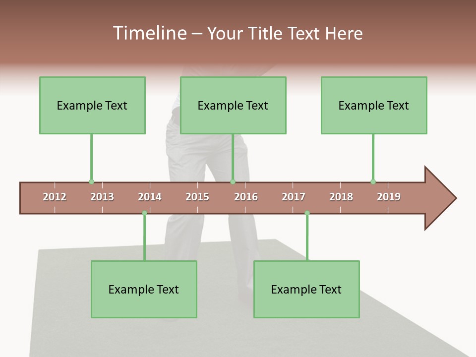 A Man Swinging A Golf Club On Top Of A Green Field PowerPoint Template