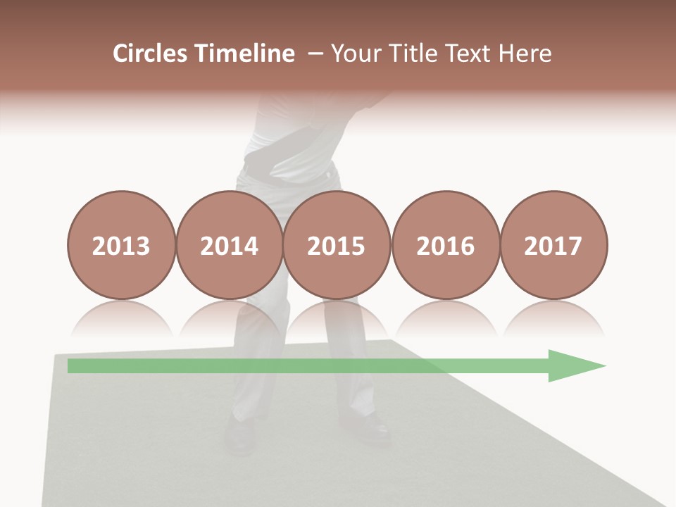 A Man Swinging A Golf Club On Top Of A Green Field PowerPoint Template