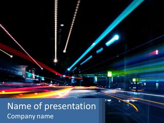 A Blurry Image Of A City Street At Night PowerPoint Template
