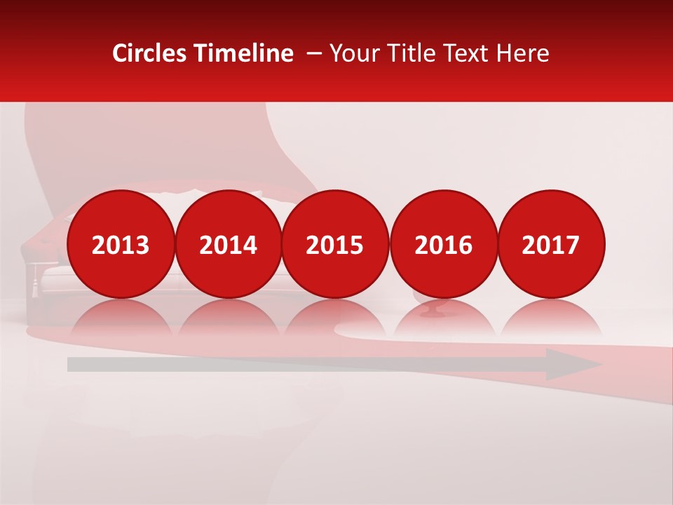 A Red And White Couch Sitting In Front Of A White Wall PowerPoint Template