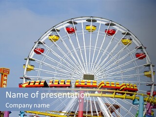A Ferris Wheel With A Blue Sky In The Background PowerPoint Template