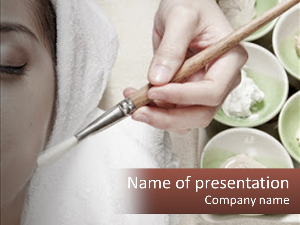 A Woman Getting A Facial Massage From A Spa Worker PowerPoint Template
