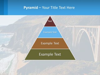 A Bridge Over A Body Of Water With Mountains In The Background PowerPoint Template