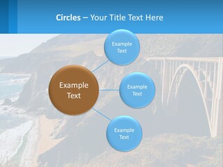 A Bridge Over A Body Of Water With Mountains In The Background PowerPoint Template