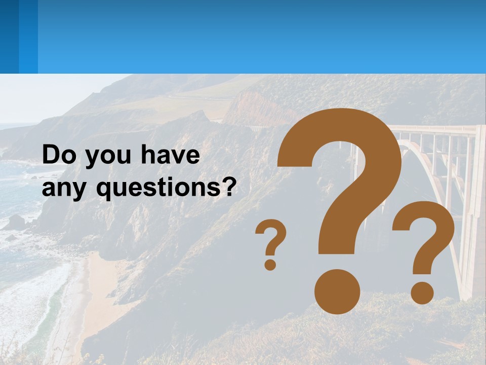 A Bridge Over A Body Of Water With Mountains In The Background PowerPoint Template