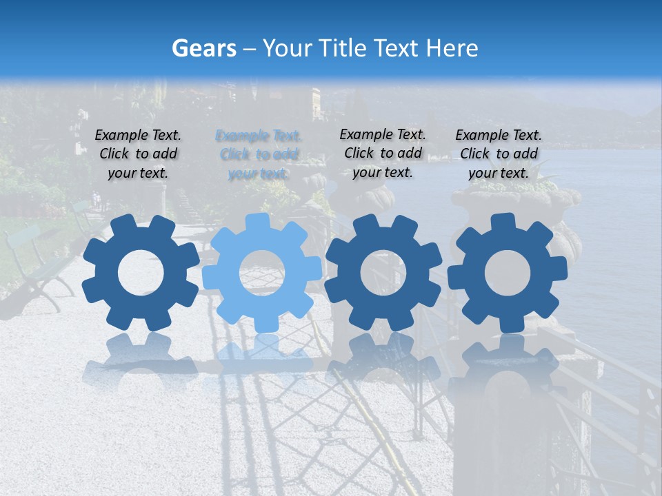 A Stone Walkway Next To A Body Of Water With Mountains In The Background PowerPoint Template