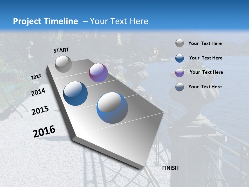 A Stone Walkway Next To A Body Of Water With Mountains In The Background PowerPoint Template