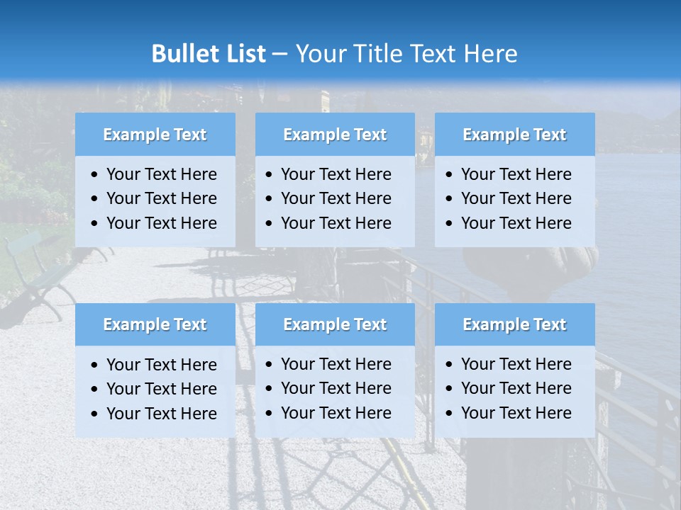 A Stone Walkway Next To A Body Of Water With Mountains In The Background PowerPoint Template