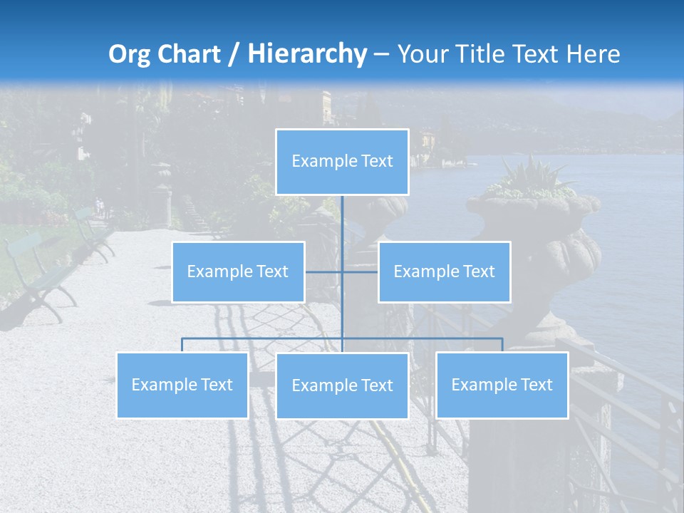 A Stone Walkway Next To A Body Of Water With Mountains In The Background PowerPoint Template