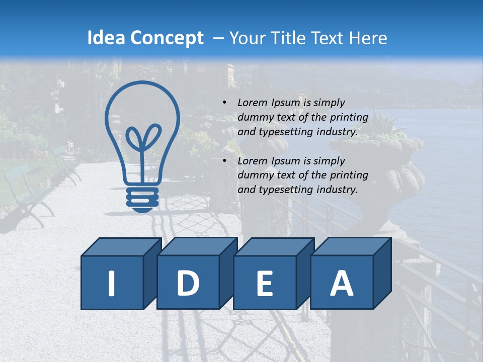 A Stone Walkway Next To A Body Of Water With Mountains In The Background PowerPoint Template