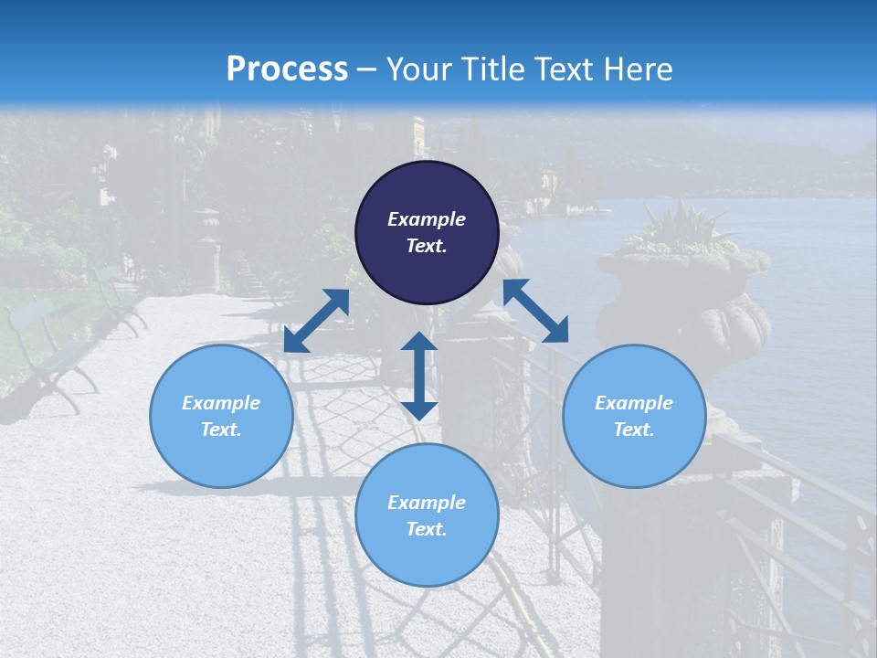 A Stone Walkway Next To A Body Of Water With Mountains In The Background PowerPoint Template