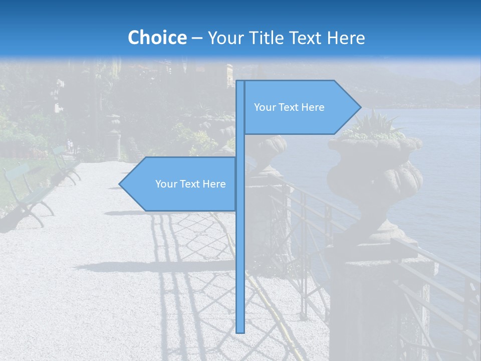 A Stone Walkway Next To A Body Of Water With Mountains In The Background PowerPoint Template