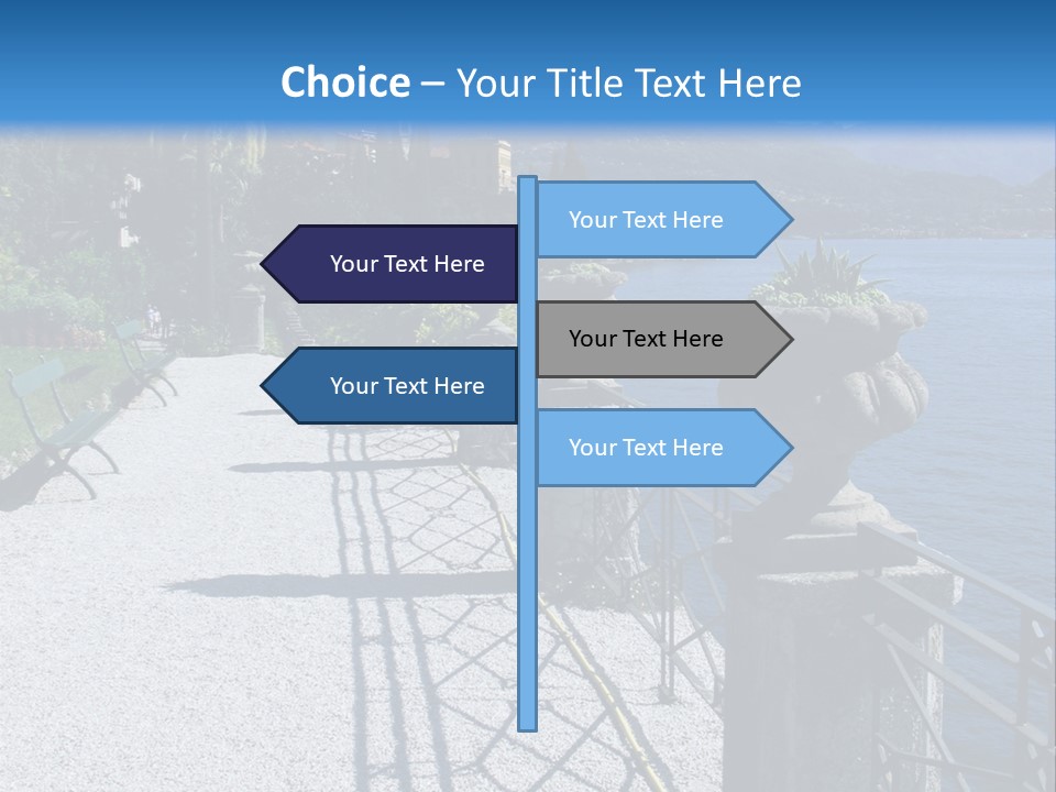 A Stone Walkway Next To A Body Of Water With Mountains In The Background PowerPoint Template