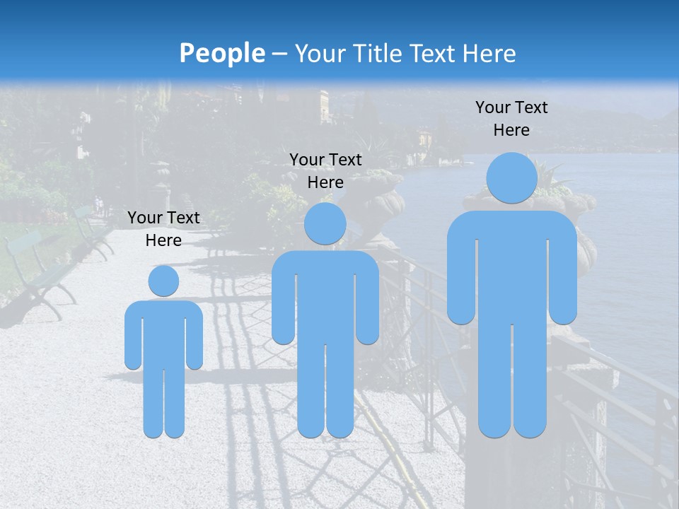 A Stone Walkway Next To A Body Of Water With Mountains In The Background PowerPoint Template