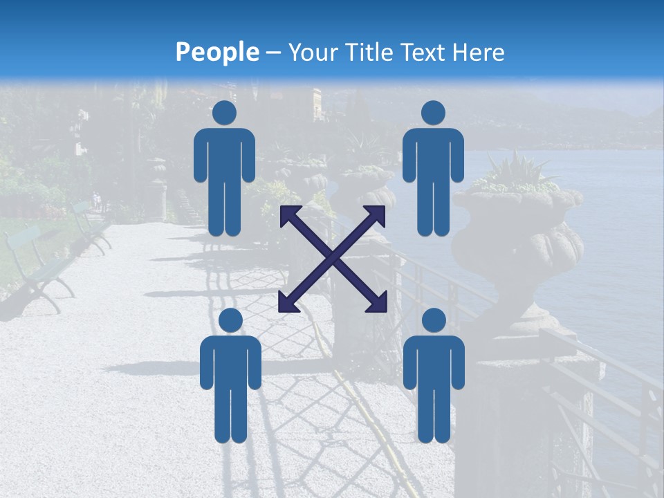 A Stone Walkway Next To A Body Of Water With Mountains In The Background PowerPoint Template