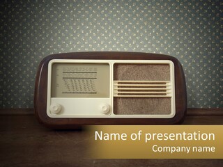 An Old Fashioned Radio Sitting On A Table PowerPoint Template