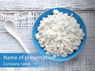 A Bowl Of Cottage Cheese Next To A Spoon PowerPoint Template