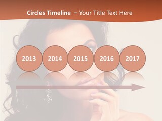 A Beautiful Woman With Long Hair Posing For A Picture PowerPoint Template