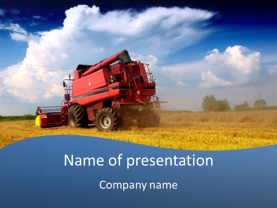 A Big Red Truck Driving Through A Field PowerPoint Template