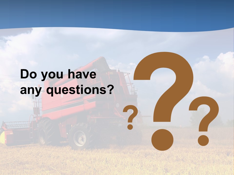 A Big Red Truck Driving Through A Field PowerPoint Template